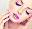 Beautiful blonde girl with lilac makeup
