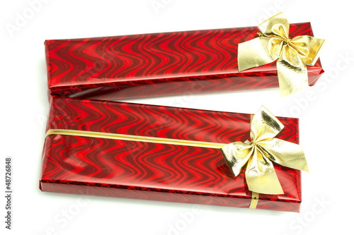 Photo: Red gifts with gold bows Red gifts with gold bows