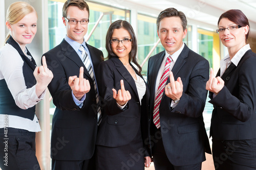 Photo: Business - group of businesspeople in office Business - group of businesspeople in office