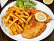 Paniertes Schnitzel mit Pommes Frites