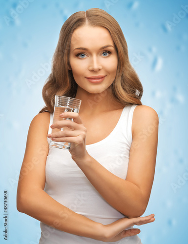 Photo: woman with glass of water woman with glass of water