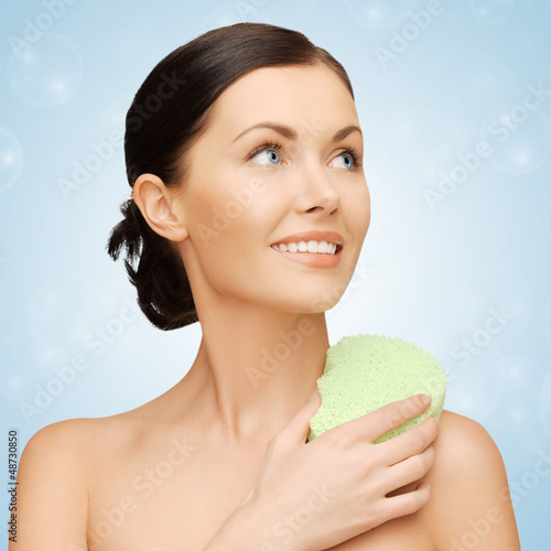 Photo: woman with sponge woman with sponge
