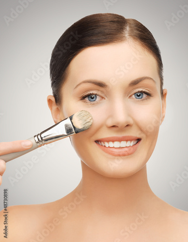 Photo: beautiful woman with brush beautiful woman with brush