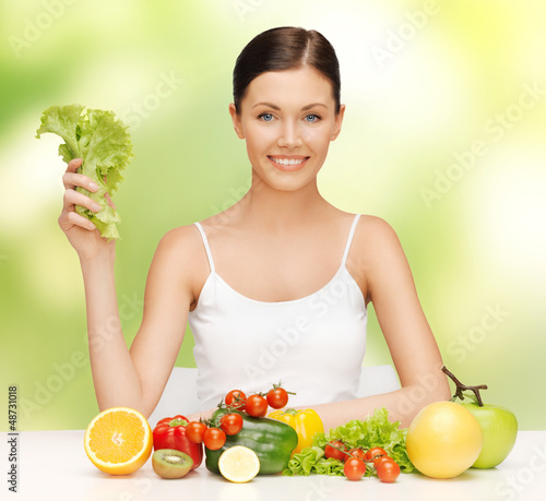 Photo: woman with fruits and vegetables woman with fruits and vegetables