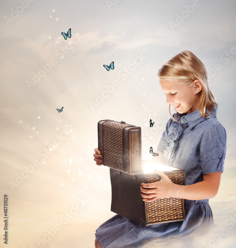 Photo: Blond Girl Opening a Treasure Box Blond Girl Opening a Treasure Box
