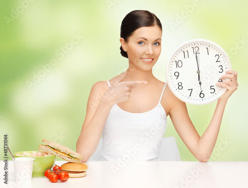 Photo: woman with big clock woman with big clock