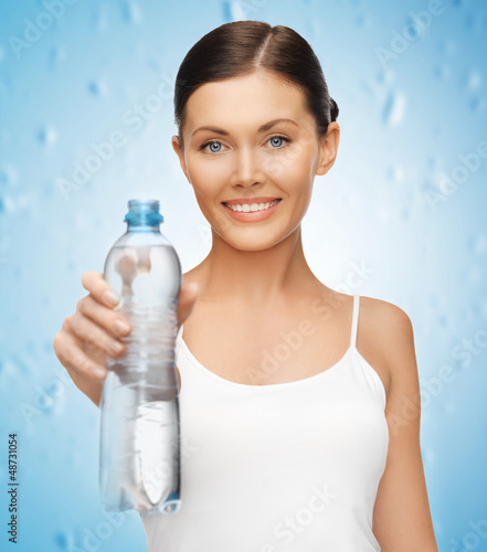 Photo: woman with bottle of water woman with bottle of water