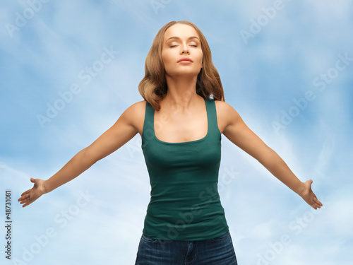 Photo: woman spreading hands woman spreading hands