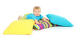 Little boy and color pillows, isolated on white