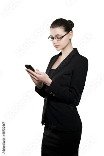 Photo: Beautiful young businesswoman with smartphone Beautiful young businesswoman with smartphone