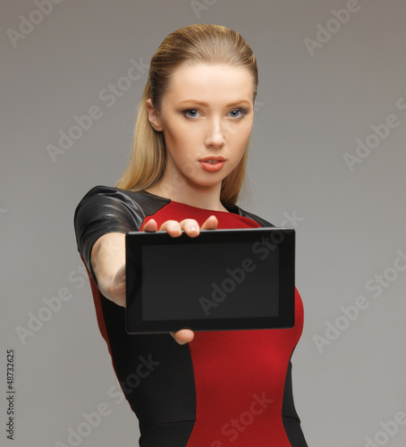 Photo: futuristic woman with tablet pc futuristic woman with tablet pc