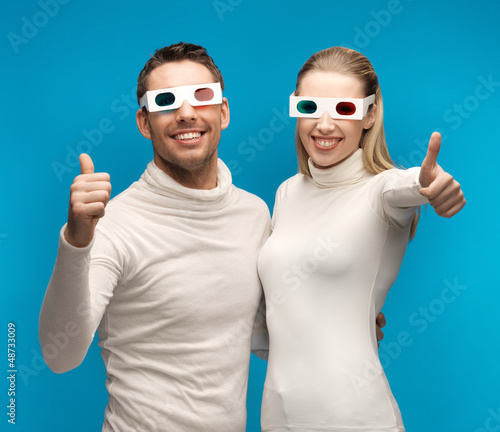 Photo: man and woman with 3d glasses man and woman with 3d glasses