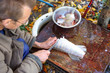 Photo: man cut up fish for cooking man cut up fish for cooking