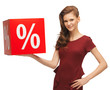teenage girl in red dress with sale sign