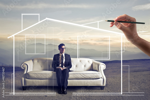 Photo: businessman on sofa at home businessman on sofa at home