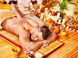 Woman getting bamboo massage.