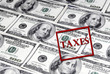 Taxes Stamped Across Cash