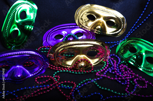 Photo: Mardi Gras Masks and Beads on Black Mardi Gras Masks and Beads on Black