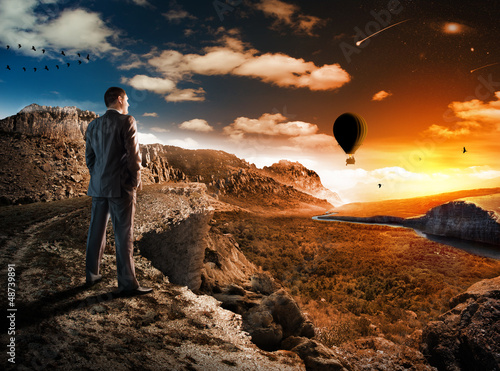 Photo: Businessman in mountains Businessman in mountains