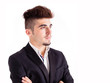 Photo: Portrait of a young businessman thinking, isolated on white Portrait of a young businessman thinking, isolated on white