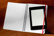 Analog Notebook and digital e-Reader with Copy Space