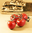 tomatoes with pizza on the background