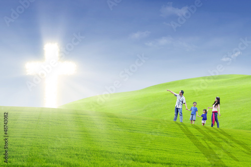 Photo: Christian family walk toward the light Christian family walk toward the light