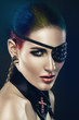 woman with coloured hair and eye-patch
