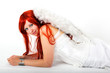 Red-haired woman as an angel