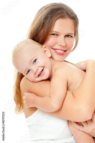 Photo: Young mother hugging baby Young mother hugging baby
