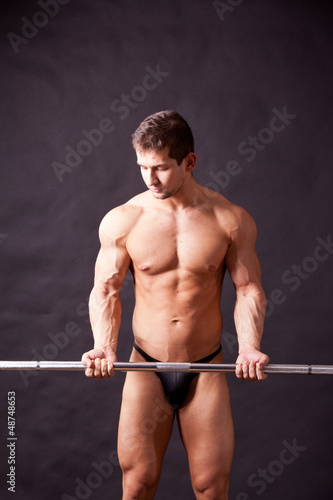Photo: young bodybuilder traininig young bodybuilder traininig