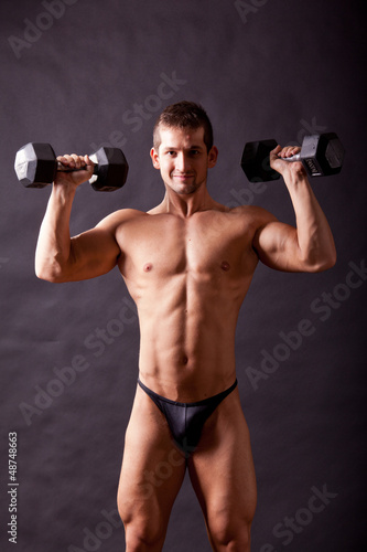 Photo: young bodybuilder traininig young bodybuilder traininig