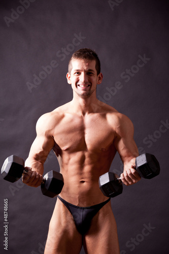 Photo: young bodybuilder traininig young bodybuilder traininig