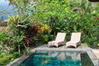 beach chairs on tropical vacation