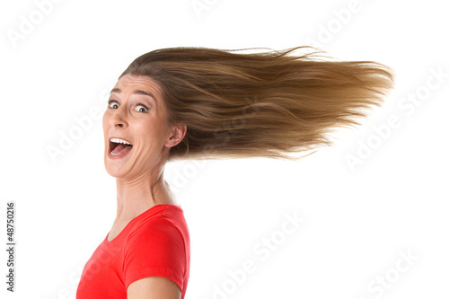 Photo: Pure Lebensfreude - Frau im Wind isoliert Pure Lebensfreude - Frau im Wind isoliert