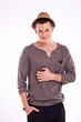 smiling man scratching his belly