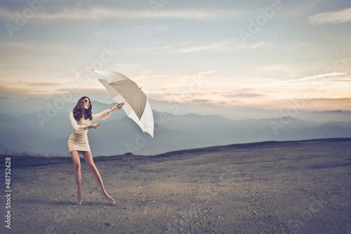 Photo: woman with umbrella woman with umbrella