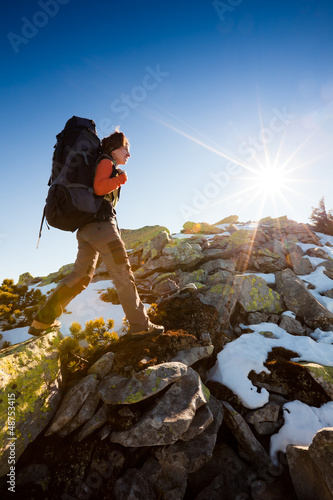 Photo: Hiker walking in autumn mountains Hiker walking in autumn mountains