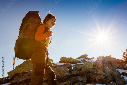 Photo: Hiker walking in autumn mountains Hiker walking in autumn mountains