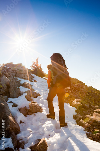 Photo: Hiker walking in autumn mountains Hiker walking in autumn mountains