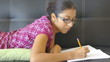 Young woman writing