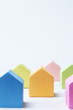 Multi Colored House Shaped Blocks On White Background
