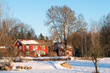 canvas print picture - Typisch rote Holzhäuser im winterlichen Schweden