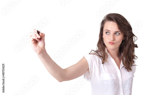 Photo: Young woman drawing on wihteboard Young woman drawing on wihteboard