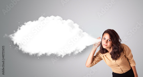 Photo: Pretty woman gesturing with abstract cloud copy space Pretty woman gesturing with abstract cloud copy space