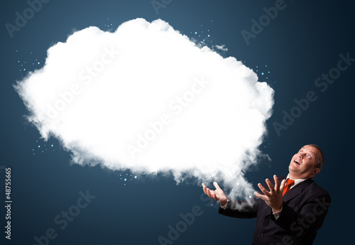 Photo: Crazy businessman presenting abstract cloud copy space Crazy businessman presenting abstract cloud copy space