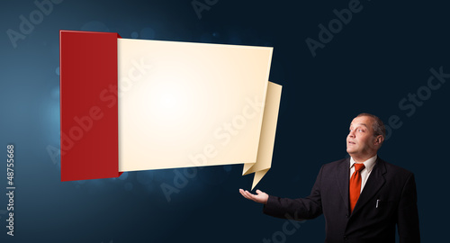 Photo: businessman presenting modern origami copy space businessman presenting modern origami copy space