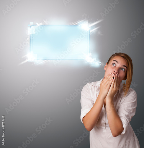Photo: Young woman with abstract modern speech bubble Young woman with abstract modern speech bubble