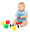 Little boy playing with multicolor blocks