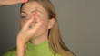time lapse clip of woman applying makeup 
